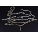 A 9ct gold ingot and chain (11.1g), silver fob chain, silver Albert and another chain