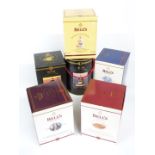 Six Bell's commemorative or celebratory whisky decanters in original boxes including Year of the