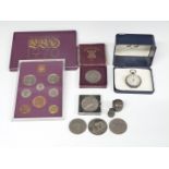 Silver cased pocket watch marked 0935, 1970 coin set, white metal thimble case, coins and Pierre