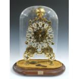 Twentieth century double fusee brass skeleton clock with cathedral shaped top stamped 'Classic