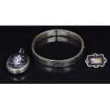 Victorian bangle set with black enamel and a Victorian mourning locket set with black and white