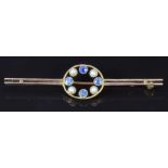 A 9ct gold brooch set with sapphires and seed pearls, 5cm, 2.3g