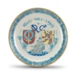 A Royal Delft de Porceleyne Fles earthenware polychrome Commemorative VOC plate, 1619-1919