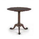 A George III mahogany tilt-top pie-crust table