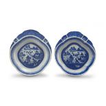A near pair of Chinese Export blue and white shell-shaped dishes, Qing Dynasty, 18th/19th century