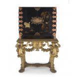 A black japanned and chinoiserie decorated brass-mounted cabinet-on-stand, 19th century