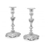 A pair of cast George II silver candlesticks, John Cafe, London, 1751