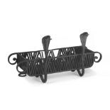 A forged iron fire grate by Kurt Jobst