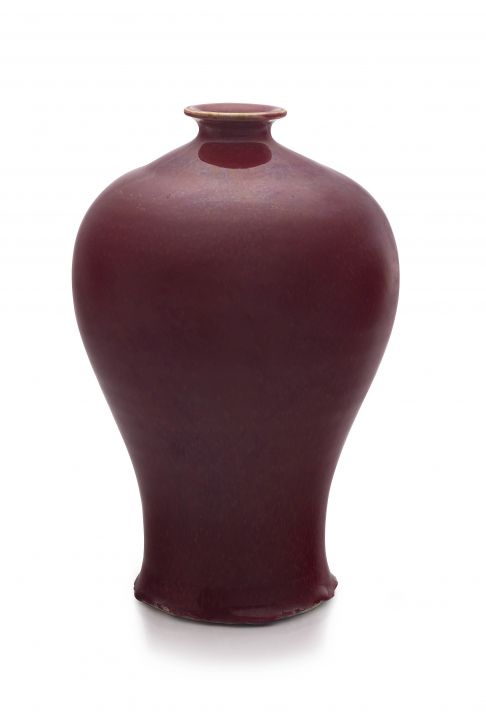 A Chinese red-glazed vase, Meiping, Qing Dynasty, 19th century