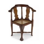 A Cape Queen Anne teak and yellowwood corner armchair, circa 1760