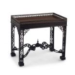 A George III style carved mahogany silver table, 19th century