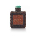 A Chinese amber and coral snuff bottle, Qing Dynasty, 19th century