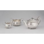 A George III silver assembled three-piece tea set, Thomas Wallis & Jonathan Hayne, London, 1812