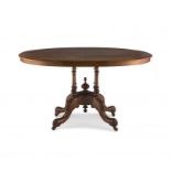 A Victorian walnut and inlaid oval tilt-top centre table