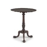 A George III style mahogany tilt-top pie crust table