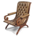 A walnut and leather upholstered armchair, late 19th century