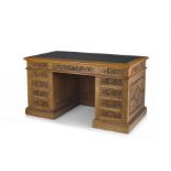 A Flemish oak pedestal desk