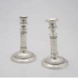 A pair of George III telescopic candlesticks, John & Thomas Settle, Sheffield, 1818