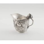 A Japanese silver milk jug, Meiji period, 1868-1912