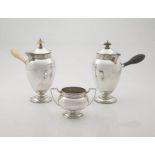 A pair of George V silver chocolate pots, Cooper Brothers & Sons Ltd, Sheffield, 1912