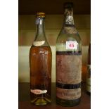 An old bottle of Vecchio Bergerac, Arlorio & Figli, (lacking label); together with a bottle of