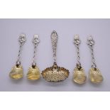 A set of four sterling silver gilt fruit spoons, by Tiffany & Co, having strawberry finials;