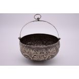 A Continental white metal repousse cauldron, 18cm diameter.