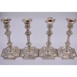 A set of four Georgian style electroplated candlesticks, by Elkington & Co, design 18106, 25cm.