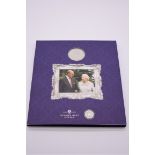 Coins: a London Mint Office 'The Royal Platinum Wedding Photographic Collection', (incomplete but