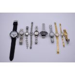 A quantity of modern ladies fashion wristwatches.