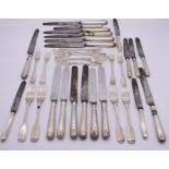 Twelve Georgian silver fiddle pattern dessert and table forks; together with six silver handled