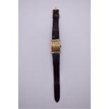 A vintage Art Deco style Bulova 14k gold filled manual wind tank watch, 21 x 33mm, ref. 8AE, on
