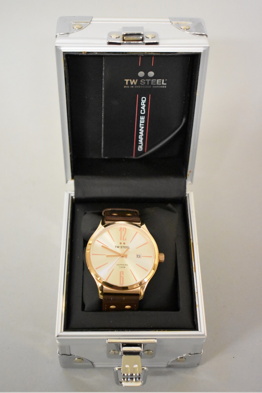 A modern TW Steel 1304 gold plated stainless steel quartz wristwatch, 45mm, on crocodile style