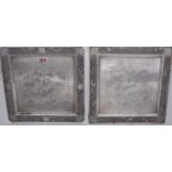 A pair of Oriental white metal chargers, inscribed T900, having repousse dragon border and