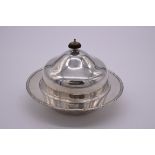 A silver muffin dish, by Barker Brothers Silver Ltd, Birmingham 1930, 18cm diameter, 452g all in.