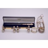 A small quantity of silver and other items, to include a silver toast rack and a cased silver