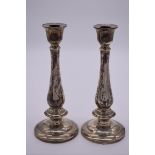 A pair of silver candlesticks, stamped 925 sterling, 22.5cm.