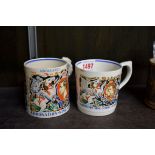 Two Laura Knight royal commemorative mugs.