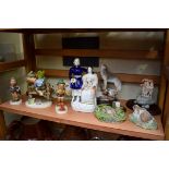 A Victorian Staffordshire pottery figure group; together with three Hummell figures, (one a.f.); and