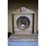 A late Victorian onyx mantel clock, 35cm high, with pendulum.