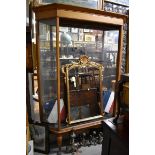 A large late 19th/early 20th century oak mirror back display cabinet, 213cm high x 162cm wide x 33cm