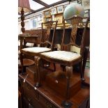 (HP) A pair of Edwardian mahogany and inlaid salon chairs.