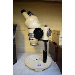 A vintage Wild Heerbrugg M5 stereo microscope, no.97457.