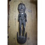 Ethnographica: a tribal ancestor figure, possibly Papua New Guinea, with cowrie eyes, 97cm high.