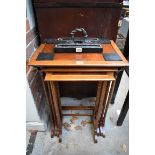 A nest of old mahogany quartetto tables, largest 49cm wide.