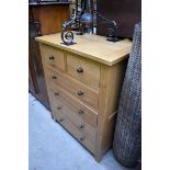 A contemporary pale oak chest of drawers, 83cm wide.