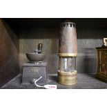 (HP) An old Kenrick & Sons coffee grinder; together with an old brass and steel miner's lamp.