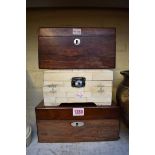 A 19th century rosewood tea caddy, 23cm wide; together with a similar vanity box, 25cm wide; and