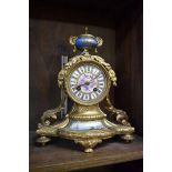 (HP) A late 19th century French gilt brass and porcelain mounted mantel clock, 28cm high, with