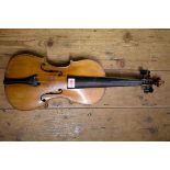 An antique Continental violin, labelled 'Caspar da Salo in Brescia', with 14in two piece back.